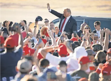  ?? DAVID WALLACE/ USA TODAY NETWORK ?? President Donald Trump visits Phoenix Goodyear Airport in Goodyear, Ariz., on Wednesday in his effort to get voters to extend his leadership of the Republican Party and the country.