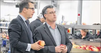  ?? +0)/ %&$045& ?? Kings-hants MP Scott Brison, left, and Scotian Gold president and CEO David Parrish tour the new production technology at Scotian Gold in Coldbrook. Brison visited Oct. 27 to officially announce $1.75 million in federal government funding toward a...