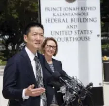  ?? MARCO GARCIA - THE ASSOCIATED PRESS ?? Hawaii Attorney General Douglas Chin, left, and Oregon Attorney General Ellen Rosenblum speak at a press conference outside the federal courthouse, Wednesday, in Honolulu. Hearings were scheduled Wednesday in Maryland, Washington state and Hawaii on...