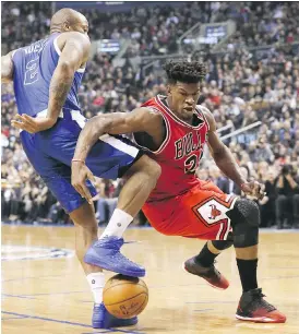  ?? VERONICA HENRI ?? Raptors forward P.J. Tucker’s defensive play helped make life tougher for Bulls star Jimmy Butler during Toronto’s win on Tuesday night.