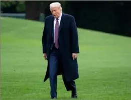  ?? Saul Loeb/ AFP via Getty Images ?? President Donald Trump walks from Marine One after arriving on the South Lawn of the White House on Thursday, following campaign events in New Jersey.