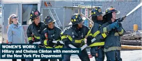  ?? ?? WOMEN’S WORK:
Hillary and Chelsea Clinton with members of the New York Fire Deparment