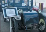  ??  ?? The addition of six electric vehicle charging stations are not the first connection to electric vehicles for the Boyertown Museum of Historic Vehicles. A 1921 Milburn electric car was on display during the unveiling of the charging stations for modern electric vehicles.