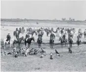  ??  ?? Frederick Thackray, with his hounds, left, and with Malik Muhammad Khan, main picture, leaving the stables; above, the Peshawar Vale Hunt in 1896