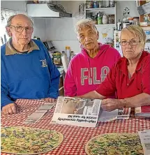  ?? WARWICK SMITH/STUFF ?? Rural residents upset banks have ignored their pleas for cheques to remain an option, from left, John Heron, Mary Kane and Julie Rush.