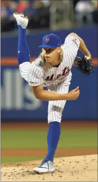  ?? Jim McIsaac / Getty Images ?? The Mets’ Noah Syndergaar­d pitchesaga­inst the Los Angeles Dodgers in 2019 in New York.