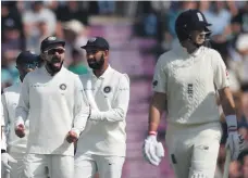  ?? Getty; Reuters ?? Sam Curran, right, is bowled by Ravichandr­an Ashwin after his knock of 78 for England yesterday, while, above, Virat Kohli celebrates after India take the wicket of Joe Root