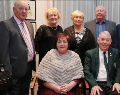  ??  ?? Greenore Captain Michael Mallie, pictured with family members at the Captain’s Dinner in Greenore.