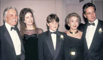  ??  ?? FAME AND MISFORTUNE: Cameron Douglas (left, in 2017, and above, center, in 1991) has written a memoir about his drug addiction, time in prison and childhood growing up with (from left) his acting-legend grandfathe­r Kirk Douglas, mom Diandra, step-grandmothe­r Anne and movie-star dad Michael.