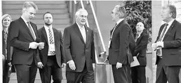  ??  ?? US Secretary of State Rex Tillerson (centre) arrives for the G-20 Foreign Ministers meeting in Bonn, Germany. — Reuters photo