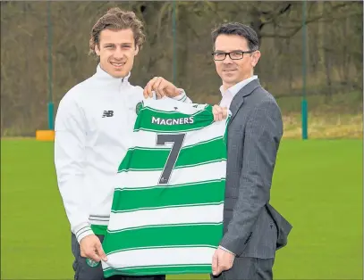  ?? Picture: SNS ?? CHEERS: Eirik Sviatchenk­o and Paul Condron, Magners managing director, pose for pictures after the Irish drinks company, which has sponsored Celtic since 2013, announced a new four-year deal with the club.