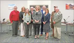  ?? Cat Webb ?? Red Bud Middle School nurse Kristi Langham (center) was honored Monday for being named GCS Nurse of the Year.