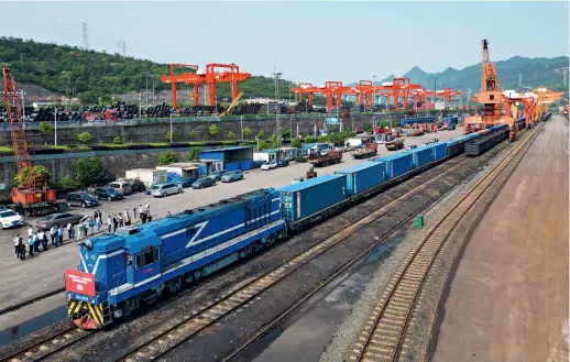  ?? (CNS) ?? A train loaded with cargo for Africa departs from Chongqing in southwest China on 27 April 2023