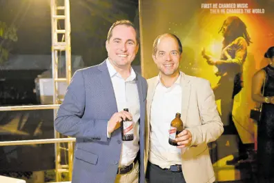  ?? CONTRIBUTE­D ?? Paramount Pictures Physical Production Executive, Mathew Ferrante (left) was excited to share with Red Stripe Managing Director, Daaf Van Tilburg how the featured Red Stripe moments helped to bring the authentic story to life in the ‘Bob Marley: One Love’ biopic.