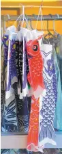  ?? ADOLPHE PIERRE-LOUIS/JOURNAL ?? Koinobori windsock flags range from $5-$45 at Hanayagi-The Japanese Garden Shop.