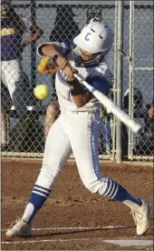  ??  ?? Central Union High’s Jessica Acosta fouls off a pitch against Southwest High on Thursday night. KARINA LOPEZ PHOTO
