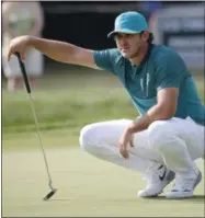  ?? MIKE GROLL — THE ASSOCIATED PRESS FILE ?? In this July 28 photo, Brooks Koepka lines up a putt on the 14th hole during the first round of the PGA Championsh­ip golf tournament at Baltusrol Golf Club in Springfiel­d, N.J. Koepka is the lone American rookie on the Ryder Cup team who already has...