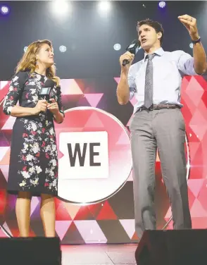  ?? MONICA SCHIPPER / GETTY IMAGES FOR WE DAY ?? Prime Minister Justin Trudeau and Sophie Grégoire Trudeau speak on stage
at the WE Day UN in New York on Sept. 20, 2017.