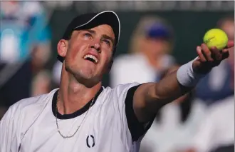  ?? MARK J. TERRILL/The Associated Press ?? Vasek Pospisil serves to Thanasi Kokkinakis of Australia at the BNP Paribas Open tennis tournament in Indian Wells, Calif. He returns to the VanOpen to challenge for the title on August 12.