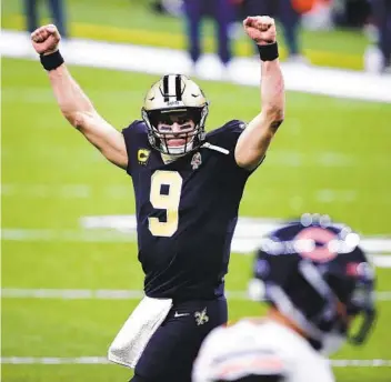  ?? BUTCH DILL AP ?? Drew Brees, who threw for 265 yards and two touchdowns, helped New Orleans beat the Bears on Sunday.