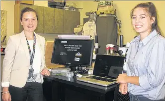  ?? WOLFVILLE, NS WENDY ELLIOTT ?? With the funds announced July 7 Dr. Nicoletta Faraone, left, and her research assistant Samantha Macpherson at Acadia University are investigat­ing the uses of a waste by product, granite dust.