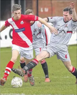  ?? Picture: Tony Flashman FM4658723 ?? Whitstable’s Kane Rowland challenged by Rochester United at Belmont on Saturday