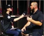  ??  ?? Kid reviewer Rodeo Marie Hanson 12, Fleetwood, interviewe­d magician Jon Dorenbos, a former Philadelph­ia Eagles long-snapper, after a recent show in Lancaster.