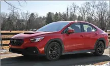  ?? MARC GRASSO — MEDIANEWS GROUP ?? The Subaru WRX is a cool car sure to get your heart racing, as well as the rest of your body as you rev the engine and get ready to test your need for speed.