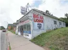  ?? MIKE DE SISTI / MILWAUKEE JOURNAL SENTINEL ?? Big Jim’s Liquor, 2161 W. Hopkins St., was one of the buildings damaged by arson during unrest in the Sherman Park neighborho­od.