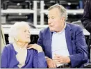  ?? (AP) ?? In this March 29, 2015 file photo, former US president George H.W. Bush and his wife Barbara Bush (left), speak before a college basketball regional final game between Gonzaga and Duke, in the NCAA basketball tournament in Houston.