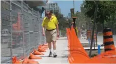  ?? JACK LAKEY/TORONTO STAR ?? This sharp-edged plastic fencing on Bloor St. W. sliced a woman’s arm.