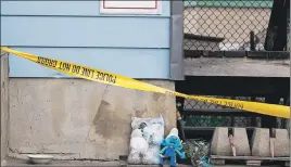  ?? CP PHOTO ?? A memorial sits outside of the home of seven-year-old victim Nathan Dumas in St. Catharines, Ont.