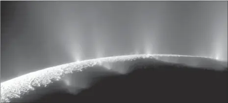  ?? Picture: NASA/AP ?? REVELATION: This February 17, 2005, image made available by Nasa shows plumes of water, ice and vapour from the south polar region of Saturn’s moon Enceladus. The activity is understood to originate from the moon’s subsurface ocean of salty liquid...