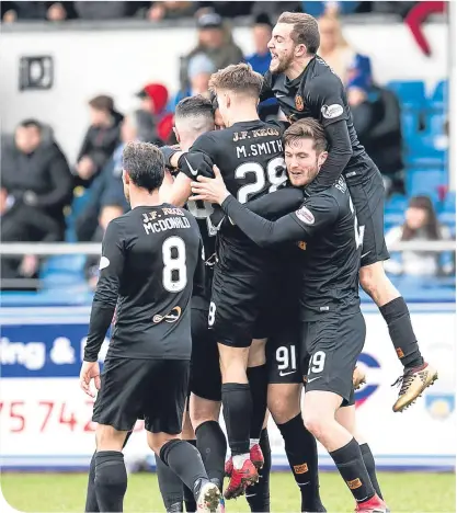  ??  ?? Dundee United players celebrate after Bilel Mohsni scored to give them the lead