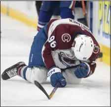  ?? JASON FRANSON/THE CANADIAN PRESS VIA AP ?? Avalanche forward Mikko Rantanen is injured after being hit by the Oilers’ Mattias Ekholm during the second period on Friday in Edmonton, Alberta.