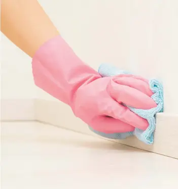  ?? GETTY ?? While the chore has a reputation for being tedious, these tips can help make cleaning baseboards a breeze.