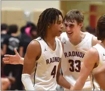  ?? PETE BANNAN — MEDIANEWS GROUP ?? Radnor’s Jackson Hicke, right, congratula­tes Charlie Thornton after Thornton hit a basket and drew the foul in the fourth quarter of Monday’s victory over Lower Merion.