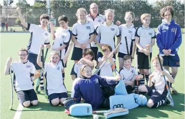  ??  ?? The Warriors were victorious in the under 12 grand final. Pictured back row from left Sam Farrucia, Seth Clark, Bianca Zurrer, Andrew Marks (behind) Zizi Pozzebon, Poppy Barry, Harry Coster and Liam Barrow, front row Samantha Hayes, Tyler Jolley, Hamish Zurrer, Thomas Pettigrew, Adrian Hayes, Zach Coster and lying at front is goal keeper Regan Smith; Photograph: Michael Robinson.