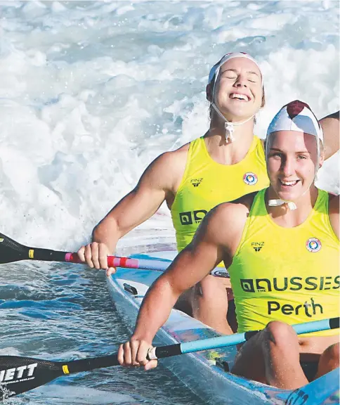  ??  ?? Danielle McKenzie (front) and Georgia Laird, of Northcliff­e, punch the air after winning the women’s double ski final.