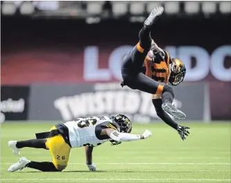  ?? CANADIAN PRESS FILE PHOTO ?? The Tiger-Cats signed defensive back Cariel Brooks, left, to a two-year contract extension Wednesday.