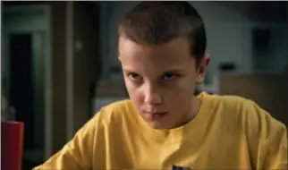  ?? NETFLIX VIA AP ?? This image released by Netflix shows Millie Bobby Brown in a scene from, “Stranger Things.” Brown portrays Eleven, who can move things with her mind and is the fascinatin­g secret friend of a group of pre-teen boys in the fictional town of Hawkins, Ind.