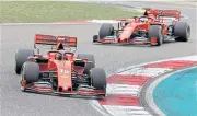  ?? REUTERS ?? Ferrari drivers Charles Leclerc, front, and Sebastian Vettel in action at the 2019 Chinese Grand Prix.