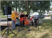  ?? JORDANA JOY — THE MORNING JOURNAL ?? Live Russian music was played at SS Peter and Paul Orthodox Church, 2238 E. 32nd St. in Lorain, during the church’s annual Russian Food Festival Aug. 16.