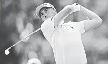  ?? DAVID DERMER THE ASSOCIATED PRESS ?? Justin Thomas watches his tee shot on the 15th hole during the second round of the Bridgeston­e Invitation­al golf tournament Friday.