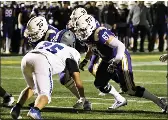  ?? ?? Senior Dante Pancotto blocks during De La Salle’s regional victory over L’Anse Creuse. Pancotto was the only returning starter on the Pilots’ offensive line this season.