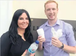  ??  ?? Councillor­s Siôn Davies and Sara Griffiths are pressing Llanelli Town Council to ditch single-use plastics.