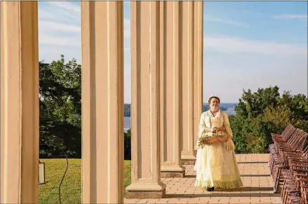  ?? PHOTOS BY GEORGE WASHINGTON’S MOUNT VERNON ?? Elizabeth Keaney says she spends 30 minutes a day lacing herself into corset-like linen stays and strapping on hip-exaggerati­ng “pocket hoops” to portray a young Martha Washington at George Washington’s Mount Vernon in Virginia.