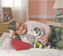  ?? ROSALIND O’CONNOR/NBC VIA AP ?? Saturday Night Live performer Aidy Bryant in a skit, ‘Joan Song,’ with a dog on Saturday. The show has used animals over the years, adding to unpredicta­ble and funny moments during the live broadcast.