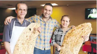  ??  ?? Salah, left, Saman and Fozieh Shamami make upward of 300 to 400 pieces of Kurdish flatbread every day — depending on demand at the restaurant and sales at the bakery.