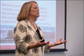  ?? ERIC BONZAR — THE MORNING JOURNAL ?? Maryann Wolowiec, president of IEL Educationa­l Consulting, discusses the intended outcomes of the Lorain County After-School Time Investment­s summit May 21, at Lorain County Community College.